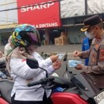 Polres Lubuklinggau dan PMII Bagikan 1.500 Masker di Tengah Kabut Asap